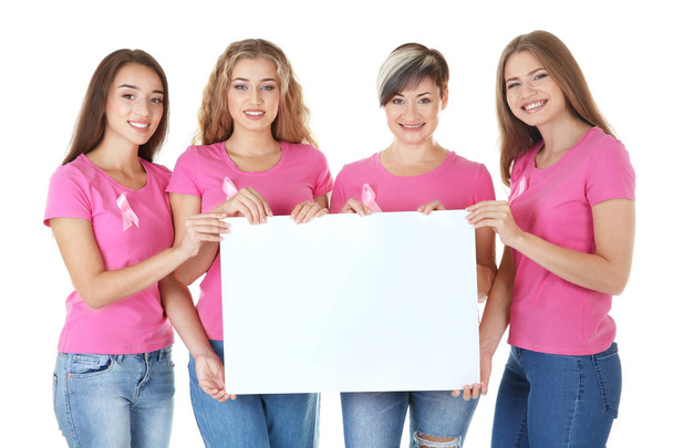 Beautiful women holding poster on white background - Foto, afbeelding