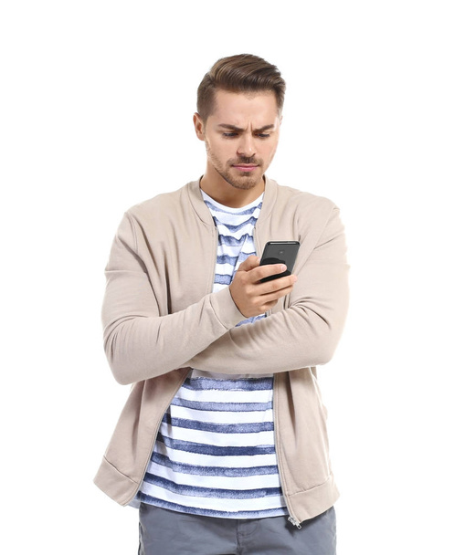 Young emotional man with mobile phone  - Photo, image