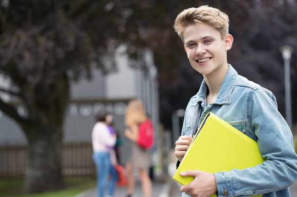 Portrait Of Male Teenage Student Outside School Building - Foto, immagini