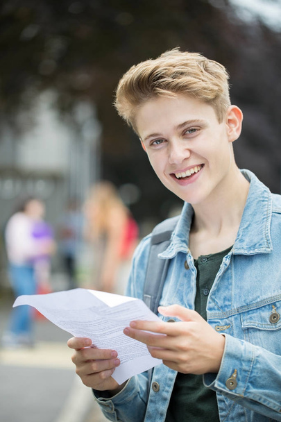 Teenage Boy Happy With Exam Results - Foto, immagini