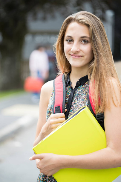 Portrait Of Female Teenage Student Outside School Building - Фото, изображение