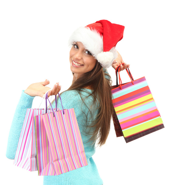 beautiful young woman with shopping bags, isolated on white - Fotó, kép