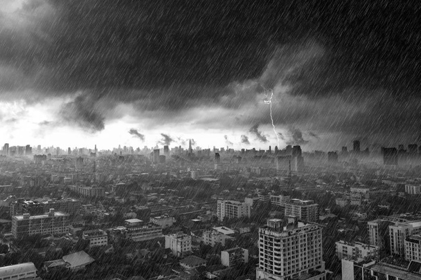 Storm clouds with heavy rain and lightning over city in Bangkok  - Photo, Image