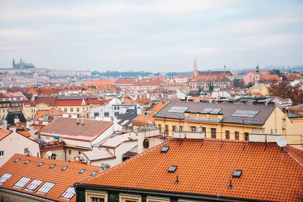 View from a high point. A beautiful view from above on the streets and roofs of houses in Prague. Traditional ancient urban architecture. - Photo, image