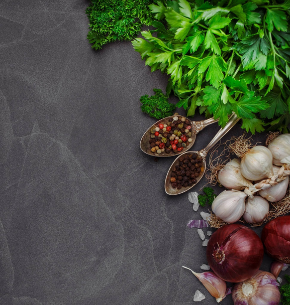 Herbs, condiments and spices on stone background. Top view. - Photo, image