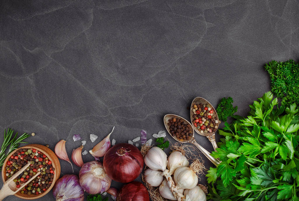 Herbs, condiments and spices on stone background. Top view. - Foto, Imagem
