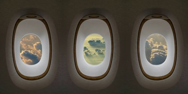 Três janelas de avião com nuvens
  - Foto, Imagem