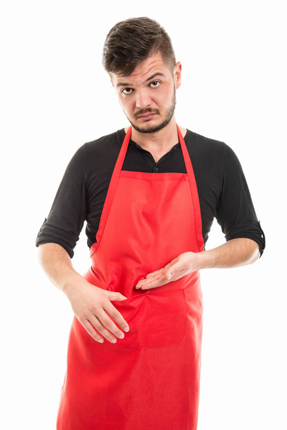 Triste employeur de supermarché masculin montrant poche vide
 - Photo, image
