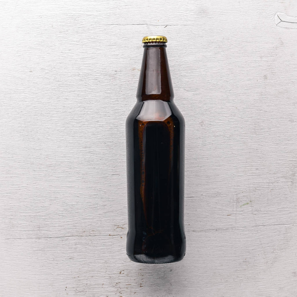 A bottle of beer. Top view. Free space for text. - Foto, Imagem