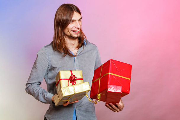 Guy with many presents gift boxes - Foto, Imagem
