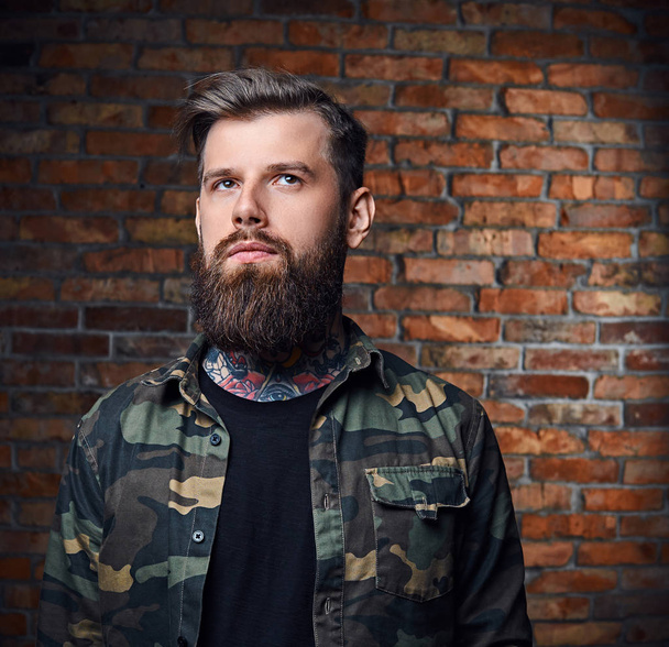 Modern bearded hipster male with tattoos - Photo, Image