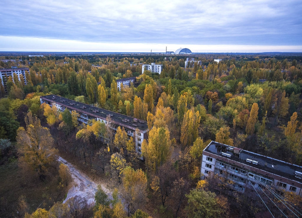 Abandoned Pripyat city in Chernobyl Exclusion Zone at autumn time - Photo, Image