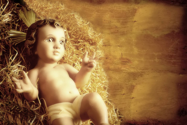 赤ん坊のキリストの古い置物クリスマス カード. - 写真・画像