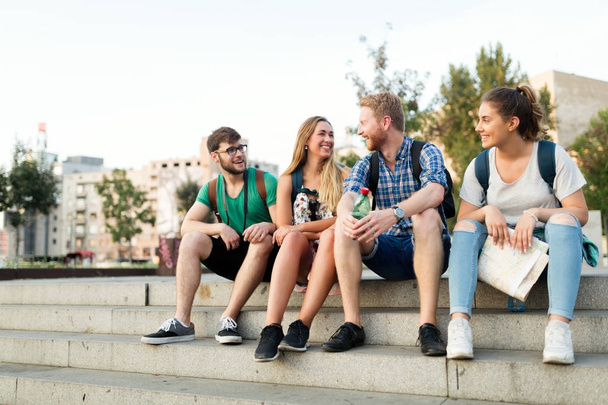 students being happy at campus stairs - Photo, Image