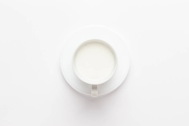 cup of milk on white - Fotoğraf, Görsel
