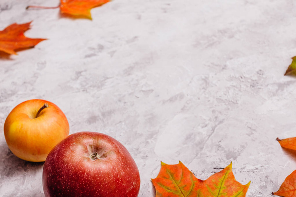 Apples on concrete surface - Фото, изображение