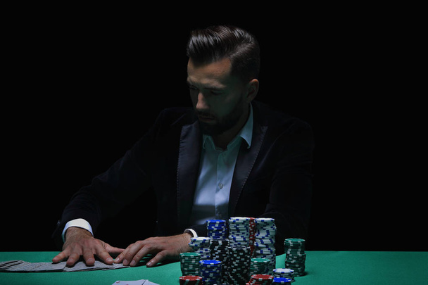 Player at the Poker table. - Foto, imagen