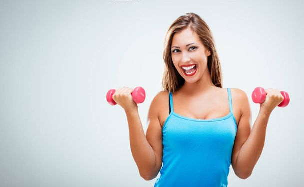 Fitnes Woman With Dumbbells   - Photo, Image