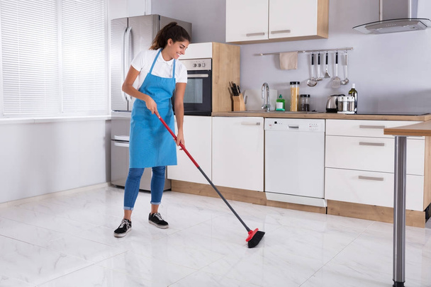 Housemaid Cleaning Floor  - Foto, imagen