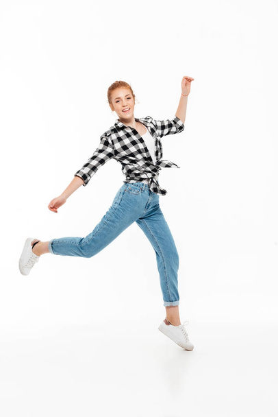 Full length image of happy ginger woman in shirt - Zdjęcie, obraz
