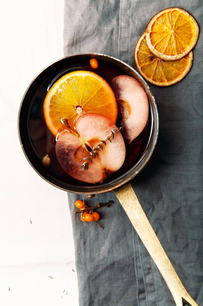 Mulled wine in copper saucepan  - Photo, Image