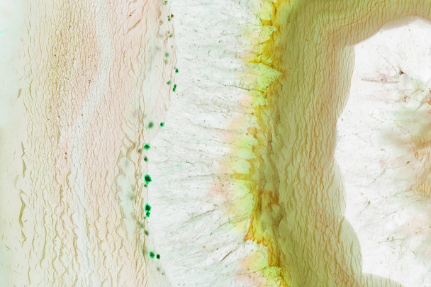 abstrakter Hintergrund - gelber und grüner Achat-Mineralquerschnitt - Foto, Bild