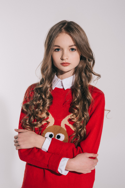 girl in red sweater with reindeer - Fotoğraf, Görsel