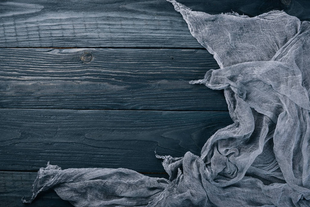Lining fabric on a wooden background. Top view. Free space for your text. - Valokuva, kuva