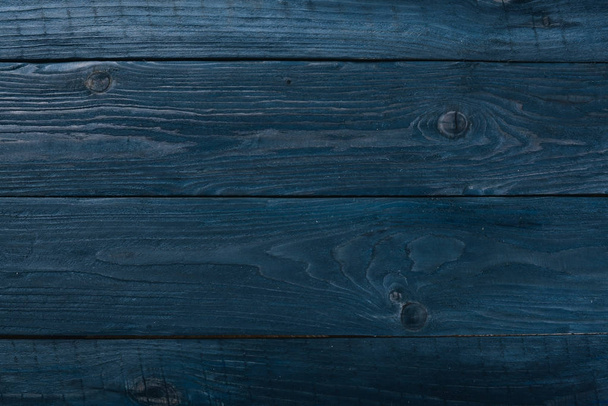 Wooden black texture background. Top view. Free space for your text. - 写真・画像