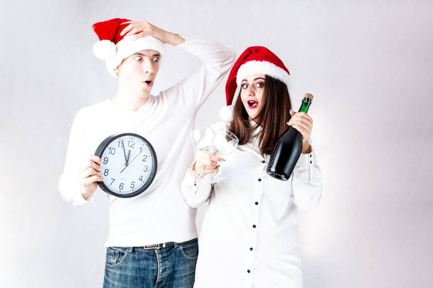 Happy couple man and fat woman celebrate Christmas and new year. - 写真・画像