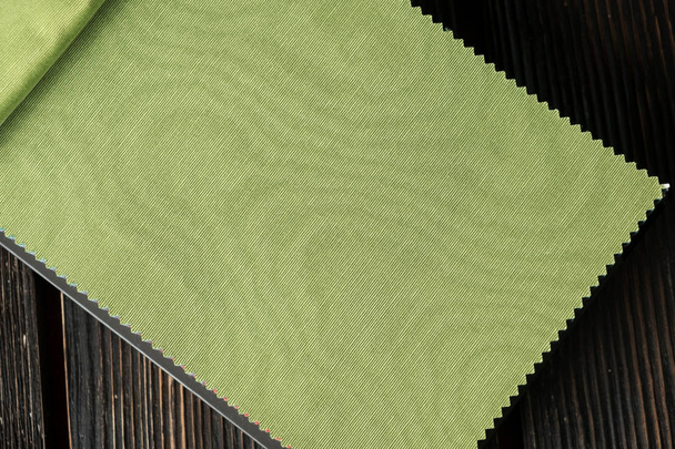 Color fabric samples palette on wood background. Green colors. - Zdjęcie, obraz
