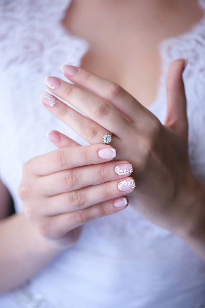 Bride showing proudly the wedding or engagement ring - 写真・画像
