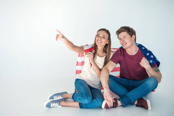 young couple with american flag - Foto, Bild
