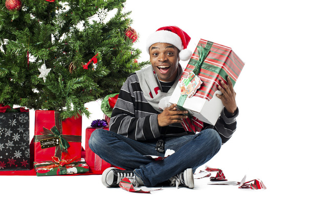 boldog fiatalember a karácsonyi ajándék - Fotó, kép
