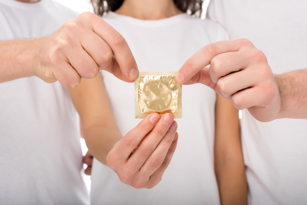groupe de personnes tenant un condom
 - Photo, image