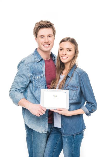 young couple with digital tablet - Photo, image