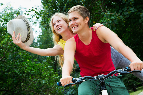 couple riding on a bicycle - Photo, Image