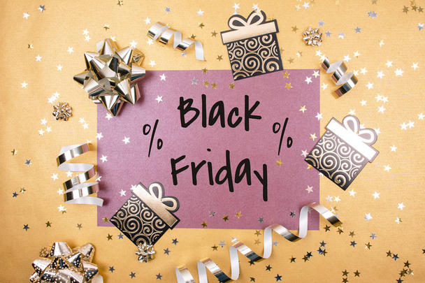 Black friday text on a gold background. - Photo, Image