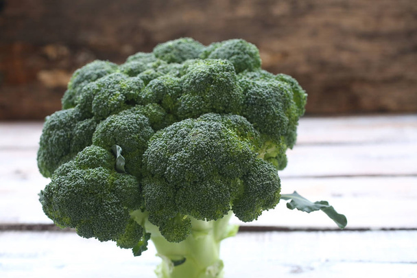 broccoli on a wooden background - Photo, Image