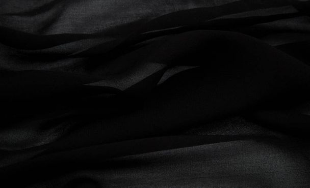 delikatne, faux jedwabne tkaniny w kolorze czarnym z podszewką - Zdjęcie, obraz