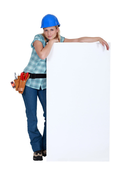 Female worker with a blank board - Valokuva, kuva