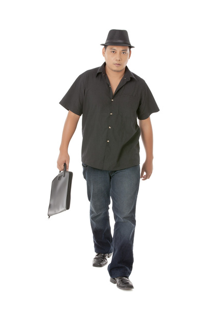 maduro asiático chico con negro bolsa
 - Foto, imagen