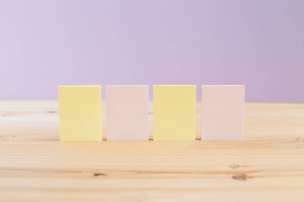 color blank sticky notes (post it) on wooden desk - Photo, Image