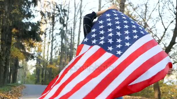 Patriotic Proud Beautiful young woman with American USA stars and stripes flag. freedom and memorial concept - Záběry, video