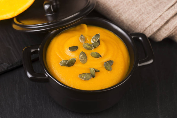 Pumpkin and carrot soup with seeds - Photo, Image