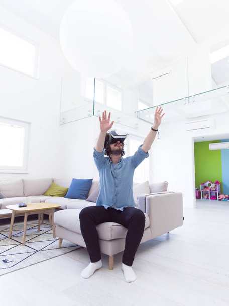man getting experience using VR  - Фото, изображение