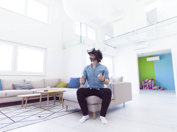 man getting experience using VR  - Фото, зображення