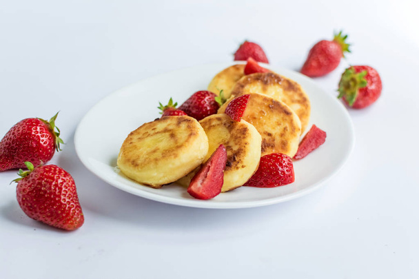 Delicious curd fritters with strawberry  - Photo, Image