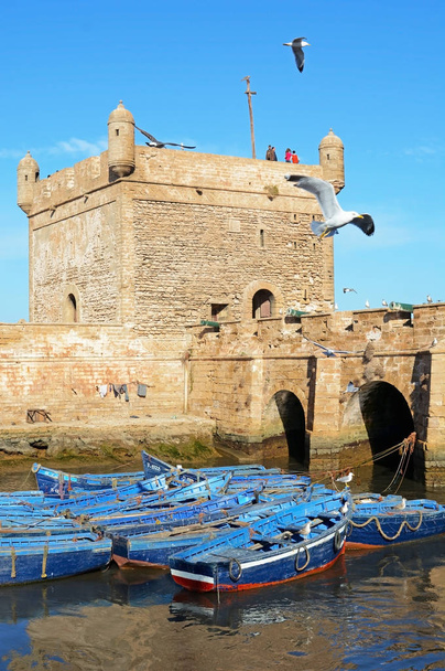 Essaouira, Morocco -  January 5, 2016: Beautiful blue boats in Essaouira old harbor - 写真・画像