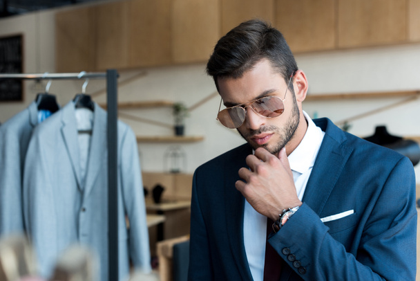 young businessman in boutique - Photo, Image
